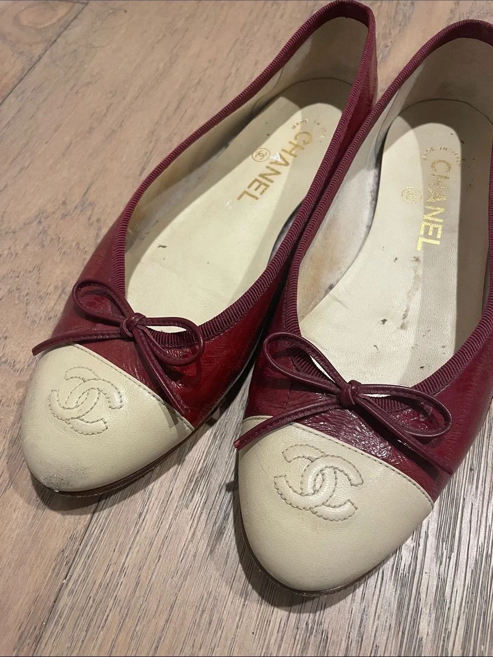 CHANEL Burgundy Eel Skin and Cream Cap-Toe Ballet Flats